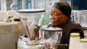 Employee brews an espresso at Beaningful, a St. Paul non-profit that helps people in transition gain job skills.
